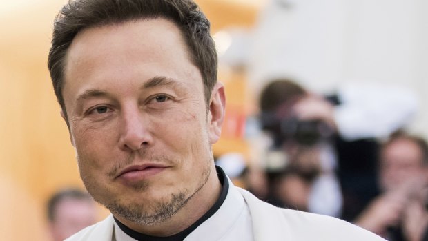 Tesla chief Elon Musk says the cuts won't affect production of its Model 3.