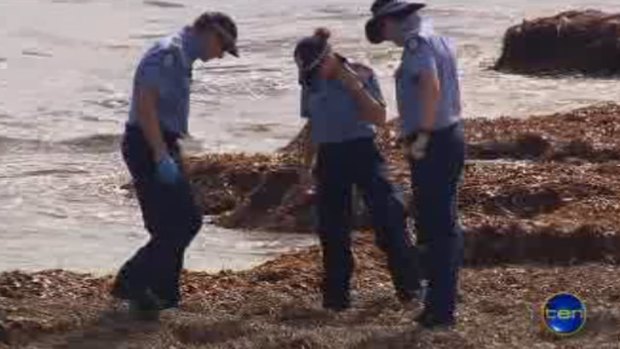 Police search areas of Rottnest Island's coastline for body parts after a man's head is found.