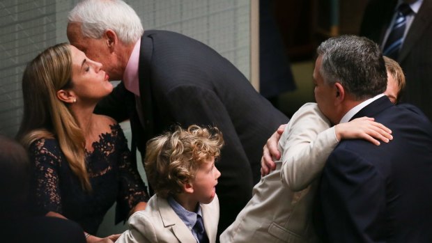 Treasurer Joe Hockey with his children Ignatius, Xavier and Adelaide Hockey after handing down the budget on Tuesday.