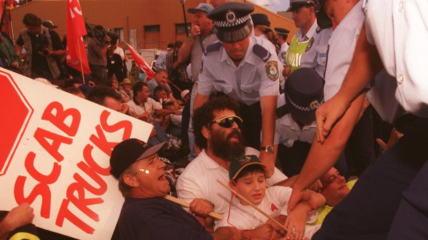 Wharfies and their families blockade Port Botany.
