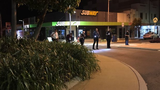 Police at Mackay CBD on May 31, following a man with two rifles reported walking through the city.