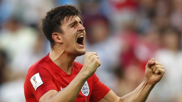 England's Harry Maguire celebrates victory of his team over Sweden.