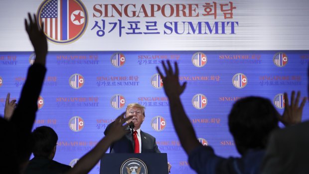 US President Donald Trump answers questions about the summit with North Korea leader Kim Jong-un during a press conference at the Capella Hotel in Singapore.
