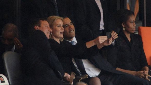 Selfie: Barack Obama and David Cameron pose for a picture with Denmark's Prime Minister Helle Thorning Schmidt.