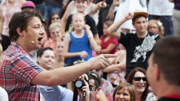 Jamie Oliver engages with the audience outside the first Australian Ministry of Food in Ipswich, Queensland.