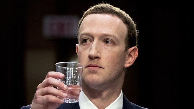 Facebook CEO Mark Zuckerberg takes a drink of water while testifying before a joint hearing of the Commerce and Judiciary Committees on Capitol Hill in Washington this week.