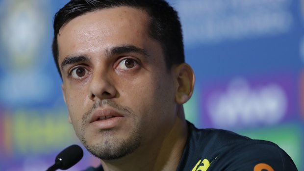 Brazil's Fagner looks on during a press conference in Sochi.