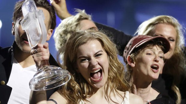 Winner of the 2013 Eurovision Song Contest Emmelie de Forest of Denmark celebrates with the trophy.