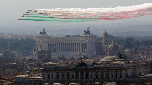 The Frecce Tricolori Italian Air Force acrobatic squad flies over Rome's skyline on the occasion of the 72nd anniversary of founding of the Italian Republic in 1946.