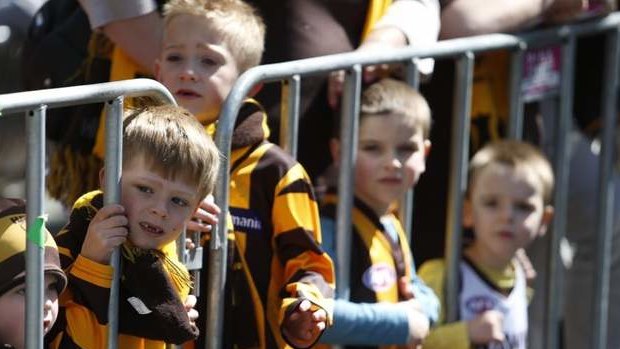 Young Hawks fans at the AFL Grand Final parade.