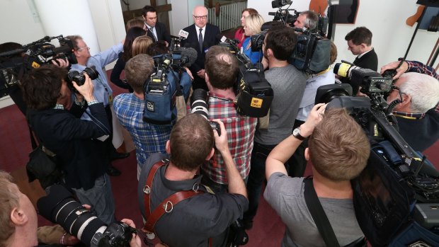 Attorney-General Senator George Brandis addresses the media in the press gallery on Thursday.