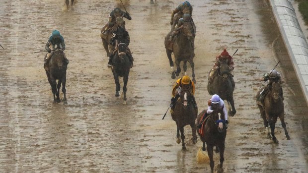 Sloppy conditions: It was wet and muddy at Churchill Downs.