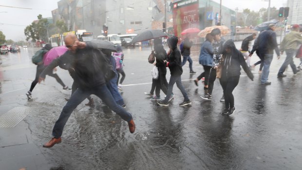 Strong winds and heavy rain hit Melbourne on Friday, but conditions will ease significantly on Saturday. 