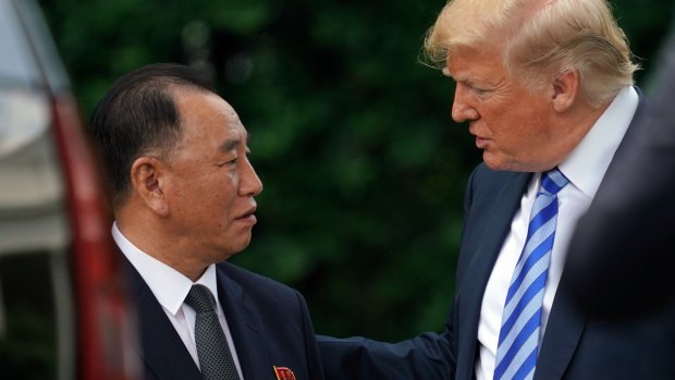 President Donald Trump talks with Kim Yong Chol, left, former North Korean military intelligence chief and one of leader Kim Jong Un's closest aides.