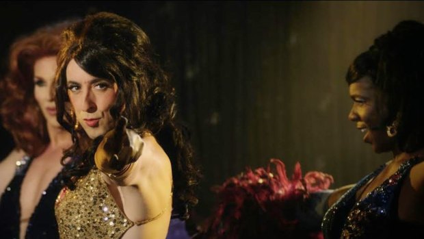 Alan Cumming (centre) stars as a drag performer in <i>Any Day Now</i>.