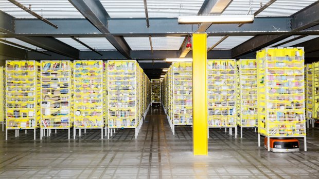 A robot fills orders inside an Amazon fulfilment centre in the US.