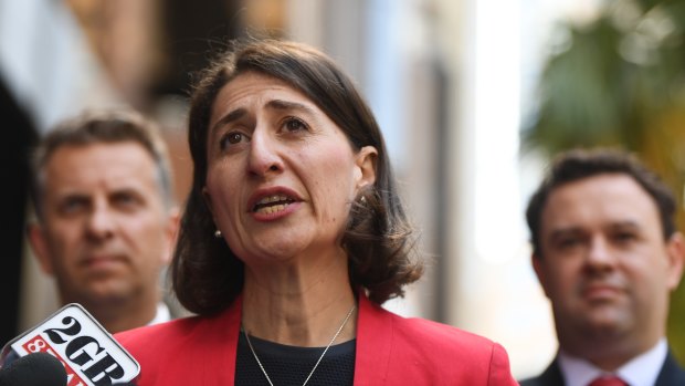 Premier Gladys Berejiklian (centre), NSW Minister for Sport Stuart Ayres (right) and Minister for Transport and Infrastructure, Andrew Constance, announcing that ANZ Stadium will be refurbished, and not replaced. 