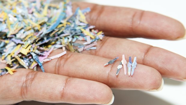 Unfit banknotes are destroyed into small pieces before being recycled. 