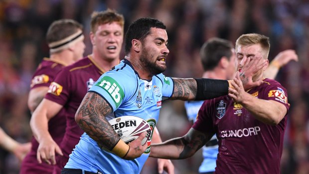 Andrew Fifita of the NSW Blues fends off Cameron Munster of the Queensland Maroons during State of Origin Game 3 between the Queensland Maroons