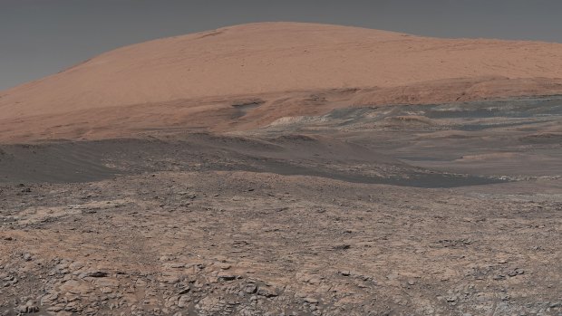 A lake-like area in front of Mount Sharp, Mars, has clay-bearing rocks that scientists are eager to explore.