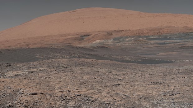 A lake-like area in front of Mount Sharp, Mars, has clay-bearing rocks that scientists are eager to explore.