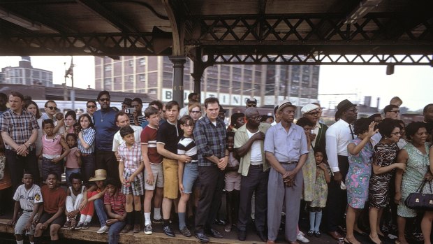 People jam a platform at a Philadelphia station as they wait for Bobby Kennedy’s coffin to pass by on a train.