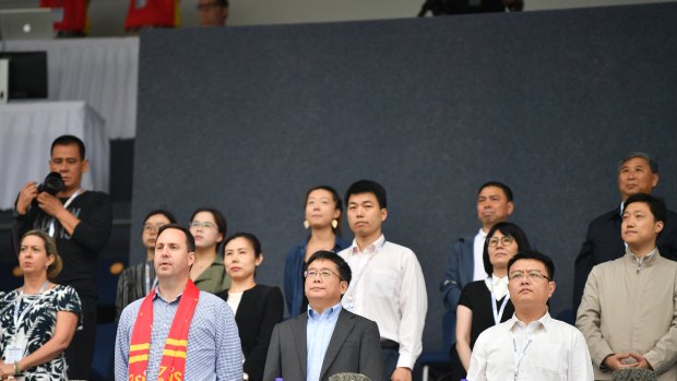 Trade Minister Steven Ciobo attends an AFL match between the Gold Coast Suns and the Port Adelaide Power at Jiangwan Stadium in Shanghai this month.