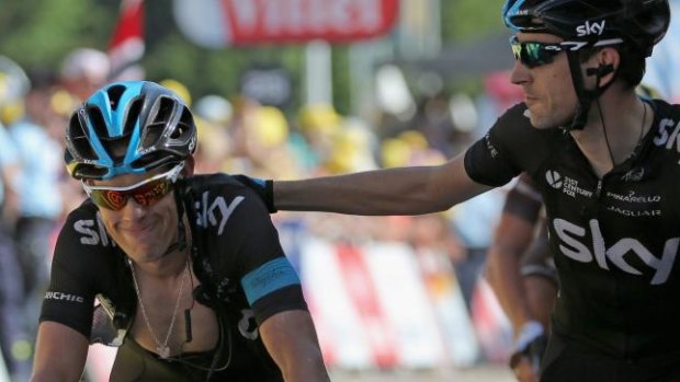 Richie Porte (left) crosses the finish line with Sky teammate Mikel Nieve Iturralde.