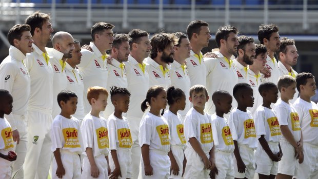 Australia's new-look team sung the anthem with gusto after shaking hands with their opponents in a new gesture of respect.