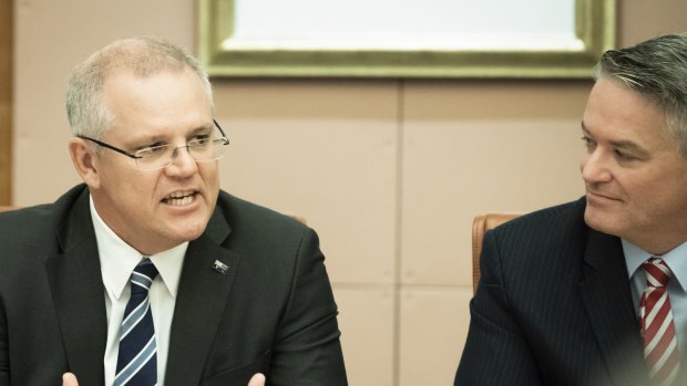 Treasurer Scott Morrison and  Minister for Finance Mathias Cormann during a cabinet meeting ahead of Treasurer Scott Morrison\'s third Budget, at Parliament House in Canberra on Monday.