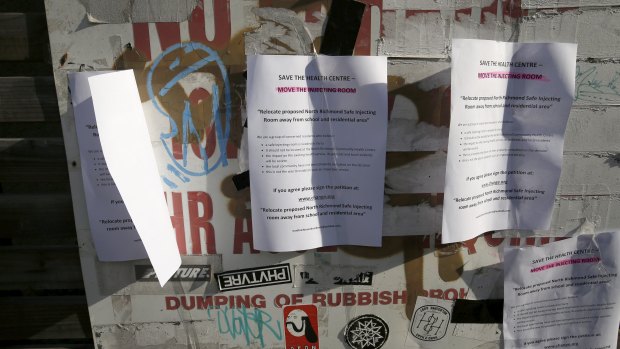 Protest flyers posted outside the safe injecting room at North Richmond Community Health. 