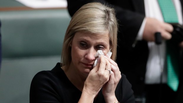 Labor MP Susan Lamb wipes away tears after delivering a statement on her citizenship after Question Time.n