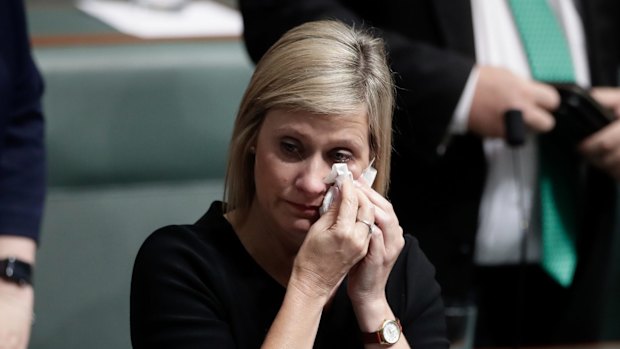 Labor MP Susan Lamb wipes away tears after delivering a statement on her citizenship after Question Time.n