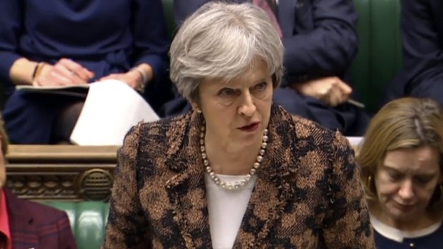 "Highly likely" Russia did it: Theresa May speaks in the House of Commons in London in March.