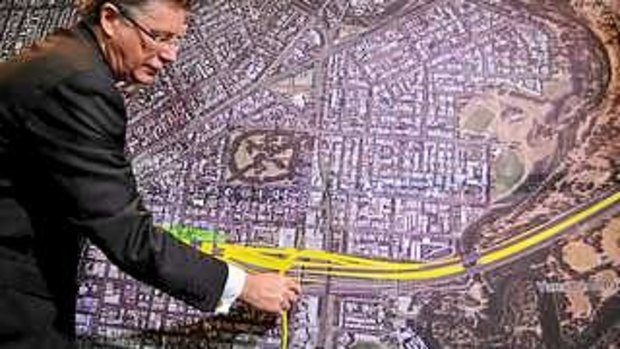 Then premier Denis Napthine announcing the design and land acquisition for East West link in 2013.