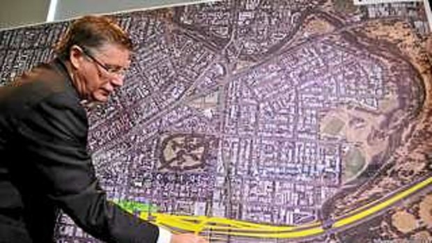 Then premier Denis Napthine announcing the design and land acquisition for East West link in 2013.