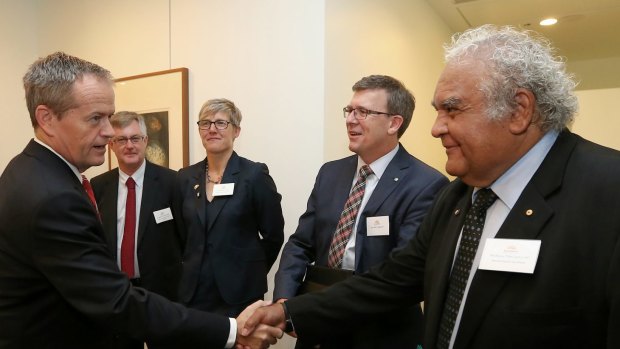 Opposition leader Bill Shorten greets Professor Tom Calma at the State of Reconciliation report launch in Canberra on Tuesday.