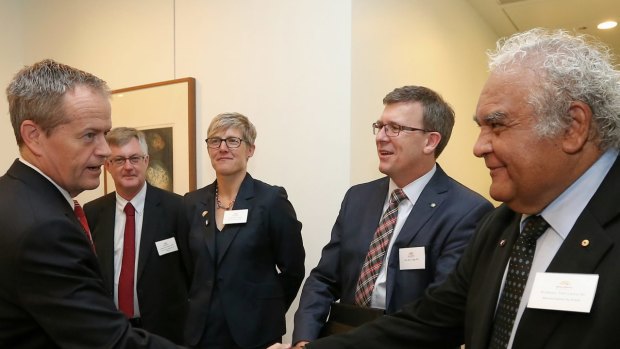 Opposition leader Bill Shorten greets Professor Tom Calma at the State of Reconciliation report launch in Canberra on Tuesday.