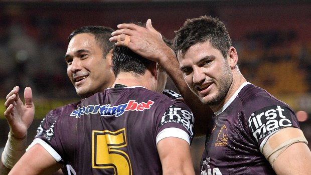 BRISBANE, AUSTRALIA - JUNE 26: Lachlan Maranta of the Broncos celebrates with team mates after scoring a try during the round 16 NRL match between the Brisbane Broncos and the Newcastle Knights at Suncorp Stadium on June 26, 2015 in Brisbane, Australia.  (Photo by Bradley Kanaris/Getty Images)