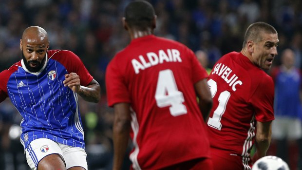 France's Thierry Henry, left, in action in a recent charity match.