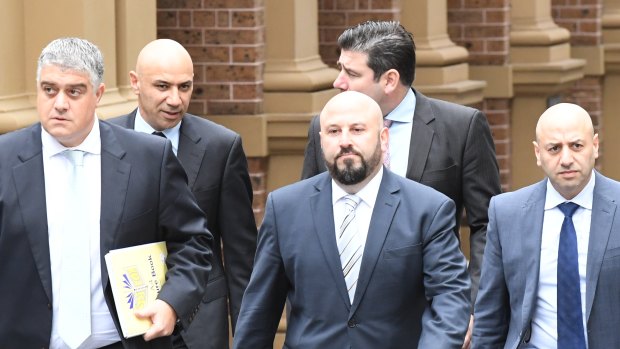 Solicitor Nick di Girolamo, Moses Obeid, Eddie Obeid Junior with beard, solicitor Tim Breene and Paul Obeid on far right at Obeid v ICAC. 