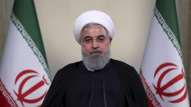 President Hassan Rouhani addresses the nation in a televised speech in Tehran, Iran.