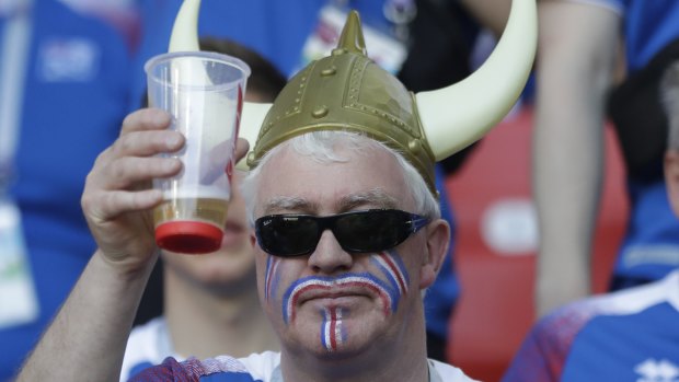 Skol! An Iceland fan raises a glass ahead of his country's match against Argentina. But beer could soon be in short supply. 