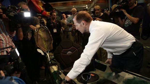 Opposition leader Tony Abbott visits the Australian Fishing Trade Show on the  Gold Coast, Queensland, on Monday.