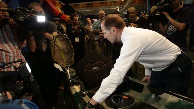 Opposition leader Tony Abbott visits the Australian Fishing Trade Show on the  Gold Coast, Queensland, on Monday.