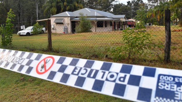 Police tape is seen at a house in Buccan where police had been investigating a missing person.