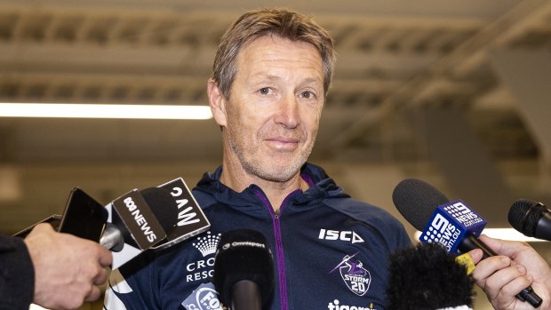 Decisions to make: Storm coach Craig Bellamy speaks to the media at Melbourne Airport.