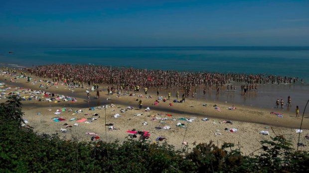 2505 women break a Guinness World record for the largest number of people skinny dipping together and at the same time raising money for the children's cancer charity 'Aoibheann's Pink Tie' on Magheramore beach near Wicklow, Ireland.