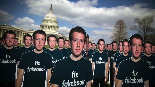 Cutouts of Facebook CEO Mark Zuckerberg are displayed on the South East lawn of the Capitol building ahead of testimony before a joint hearing of the Senate Judiciary and Commerce Committees in Washington, DC.