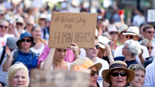 Participants seen at the crowd at #HelsinkiCalling at the march in Helsinkil on Sunday.